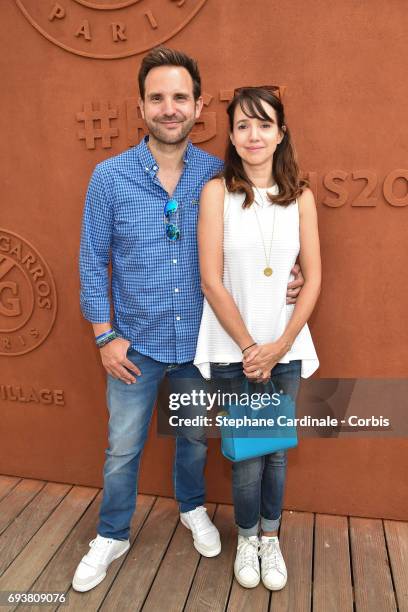 Christophe Michalak and his Wife Delphine Michalak attend the French Tennis Open 2017 - Day Twelve at Roland Garros on June 8, 2017 in Paris, France.