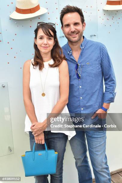 Christophe Michalak and his Wife Delphine Michalak attend the French Tennis Open 2017 - Day Twelve at Roland Garros on June 8, 2017 in Paris, France.