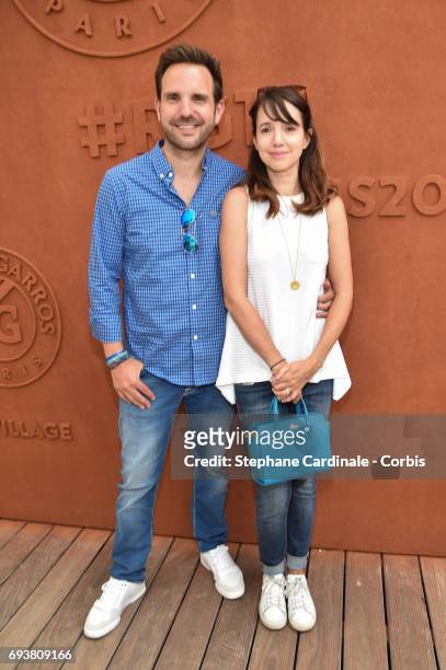 Christophe Michalak and his Wife Delphine Michalak attend the French Tennis Open 2017 - Day Twelve at Roland Garros on June 8, 2017 in Paris, France.