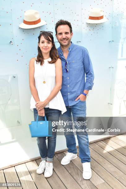 Christophe Michalak and his Wife Delphine Michalak attend the French Tennis Open 2017 - Day Twelve at Roland Garros on June 8, 2017 in Paris, France.