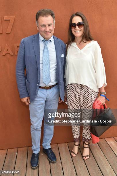Pierre Sled and a guest attend the French Tennis Open 2017 - Day Twelve at Roland Garros on June 8, 2017 in Paris, France.