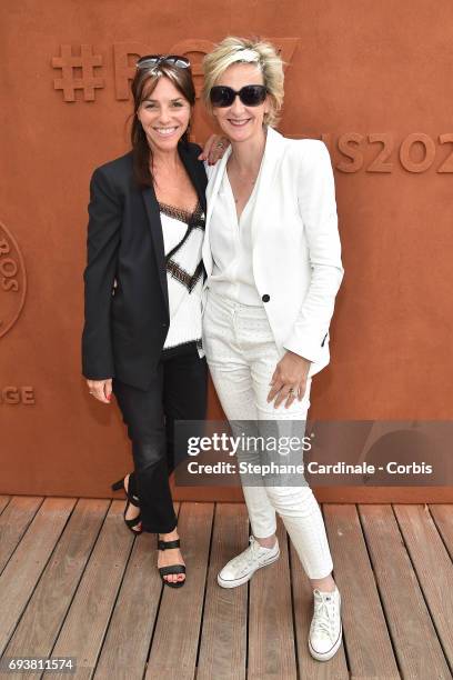 Journalists Sophie Le Saint and Sylvie Adigard attend the French Tennis Open 2017 - Day Twelve at Roland Garros on June 8, 2017 in Paris, France.