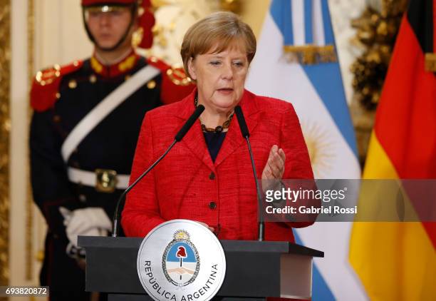 German Chancellor Angela Merkel speaks during a press conference as part of an official visit of German Chancellor Angela Merkel to Argentina at Casa...