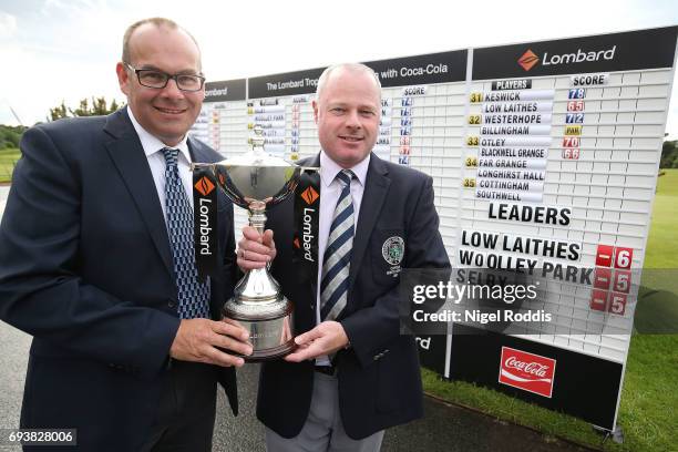 Adrian Ambler and Simon Matthews of Low Laithes Golf Club pose for pictures after winning the Lombard Trophy North Qualifier at Moortown Golf Club on...