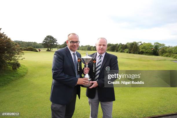 Adrian Ambler and Simon Matthews of Low Laithes Golf Club pose for pictures after winning the Lombard Trophy North Qualifier at Moortown Golf Club on...