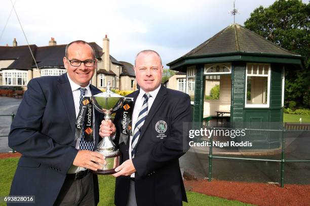 Adrian Ambler and Simon Matthews of Low Laithes Golf Club pose for pictures after winning the Lombard Trophy North Qualifier at Moortown Golf Club on...