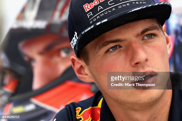 Max Verstappen of Netherlands and Red Bull Racing talks to the media in the Paddock during previews for the Canadian Formula One Grand Prix at...