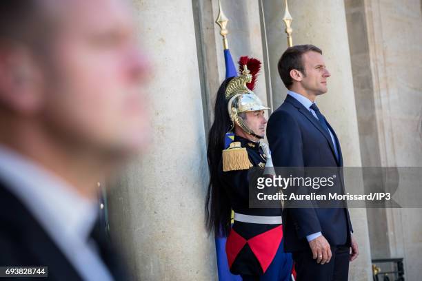 French President Emmanuel Macron welcomes President of the Republic of Peru Pedro Pablo Kuczynski for a meeting at the Elysee Palace on June 8, 2017...