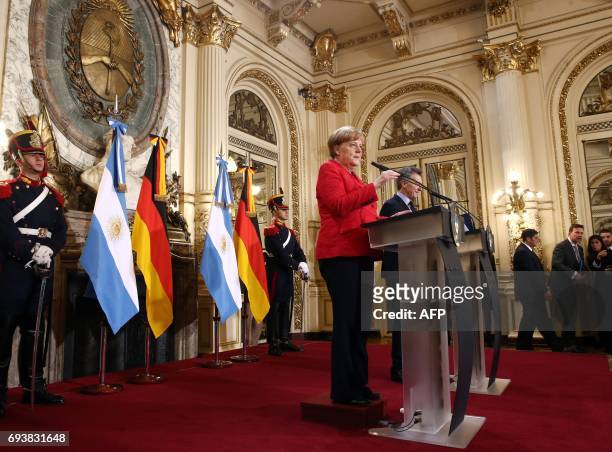 German Chancellor Angela Merkel and Argentinian President Mauricio Macri offer a joint conference after holding a working meeting at the Casa Rosada...
