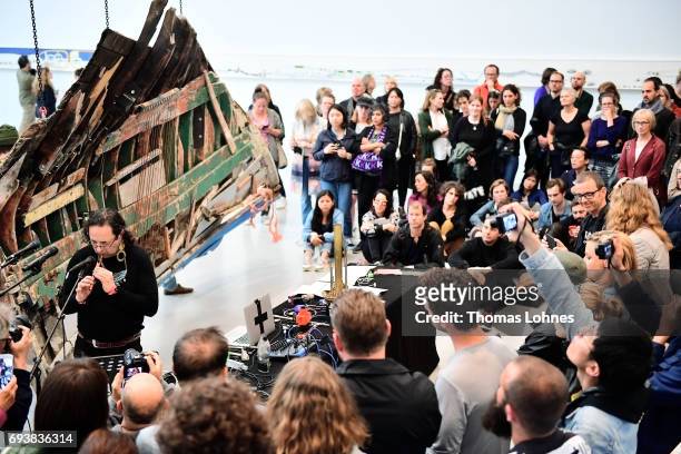 Artist Guillermo Galindo of Mexico performs with his artwork 'Sonic Borders 2' at 'documenta hall' on June 8, 2017 in Kassel, Germany. The documenta...