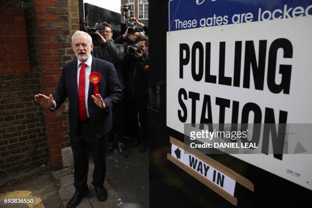 Britain's main opposition Labour Party leader Jeremy Corbyn leaves a polling station after casting his vote in north London on June 8 as Britain...