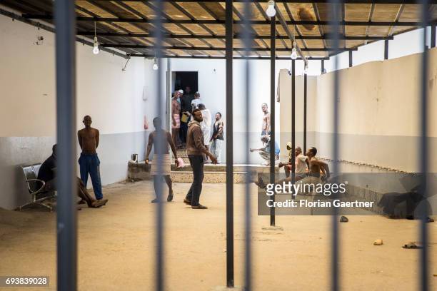 Young men are pictured in a Detention Center on June 08, 2017 in Tripolis, Libya. A detention center place where illegal migrants are arrested.