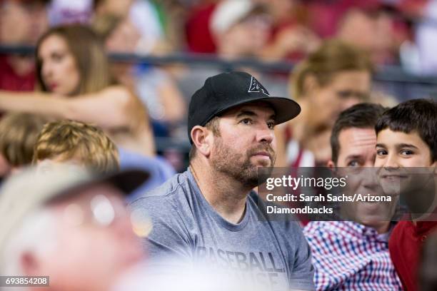 Zach Lind member of the band Jimmy Eat World watches a game against the Arizona Diamondbacks and San Diego Padres at Chase Field on June 6, 2017 in...