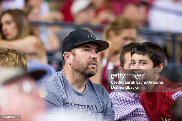 Zach Lind member of the band Jimmy Eat World watches a game against the Arizona Diamondbacks and San Diego Padres at Chase Field on June 6, 2017 in...