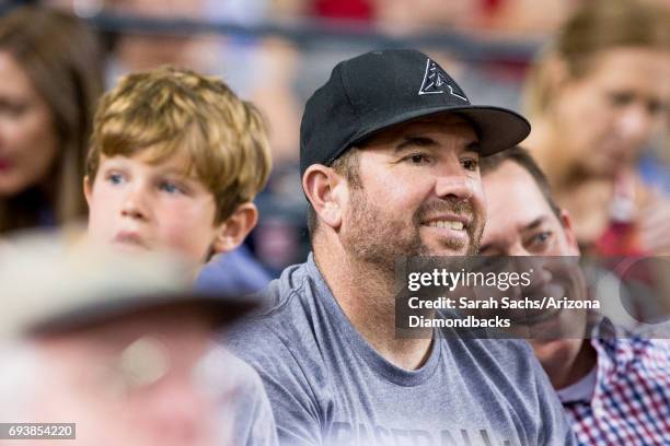 Zach Lind member of the band Jimmy Eat World watches a game against the Arizona Diamondbacks and San Diego Padres at Chase Field on June 6, 2017 in...