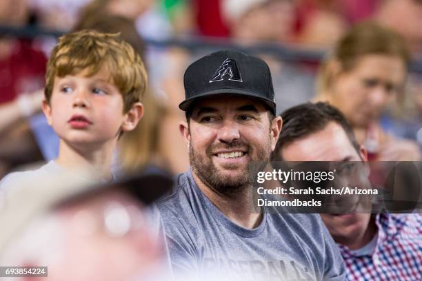 Zach Lind member of the band Jimmy Eat World watches a game against the Arizona Diamondbacks and San Diego Padres at Chase Field on June 6, 2017 in...