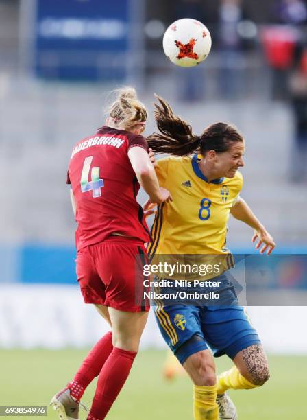 Becky Sauerbrunn of USA and Lotta Schelin of Sweden competes for the ball during the international friendly between Sweden and USA at Ullevi Stadium...