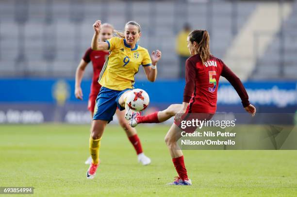 Kosovare Asllani of Sweden and Kelley O'Hara of USA competes for the ball during the international friendly between Sweden and USA at Ullevi Stadium...