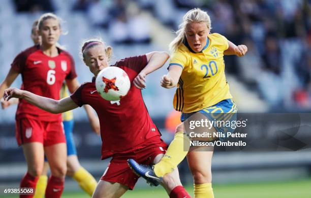 Becky Sauerbrunn of USA and Mimmi Larsson of Sweden competes for the ball during the international friendly between Sweden and USA at Ullevi Stadium...