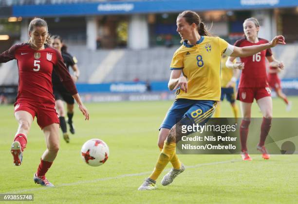 Kelley O'Hara of USA and Lotta Schelin of Sweden competes for the ball during the international friendly between Sweden and USA at Ullevi Stadium on...