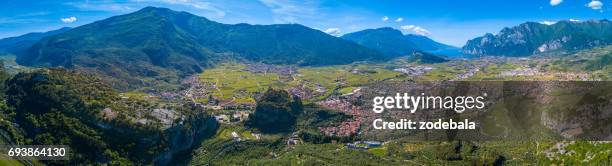 aerial view of the town of arco and lake garda, italy - arco stock pictures, royalty-free photos & images