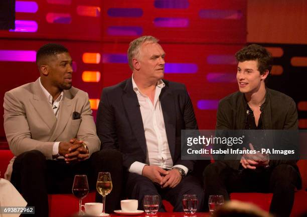 Anthony Joshua, Greg Davies and Shawn Mendes during filming of the Graham Norton Show at the London Studios, to be aired on BBC One on Friday evening.