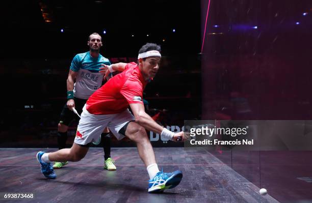 Mohamed El Shorbagy of Egypt competes against Gregory Gaultier of France during day three of the PSA Dubai World Series Finals 2017 at Dubai Opera on...
