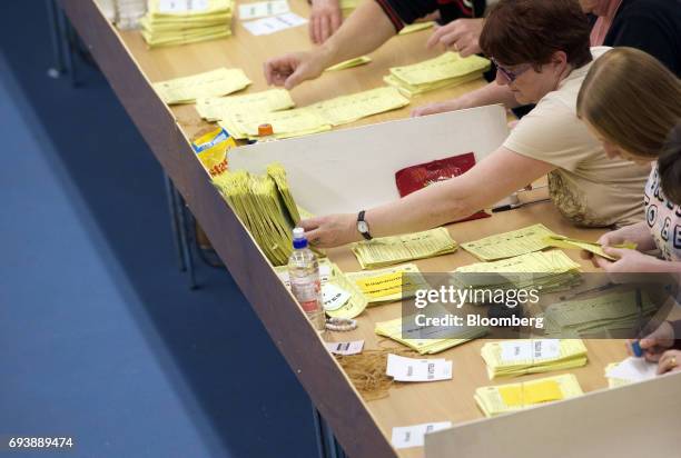 Volunteers count ballot papers for three constituencies in Tyne and Wear ceremonial county at the Silksworth Community Pool, Tennis and Wellness...