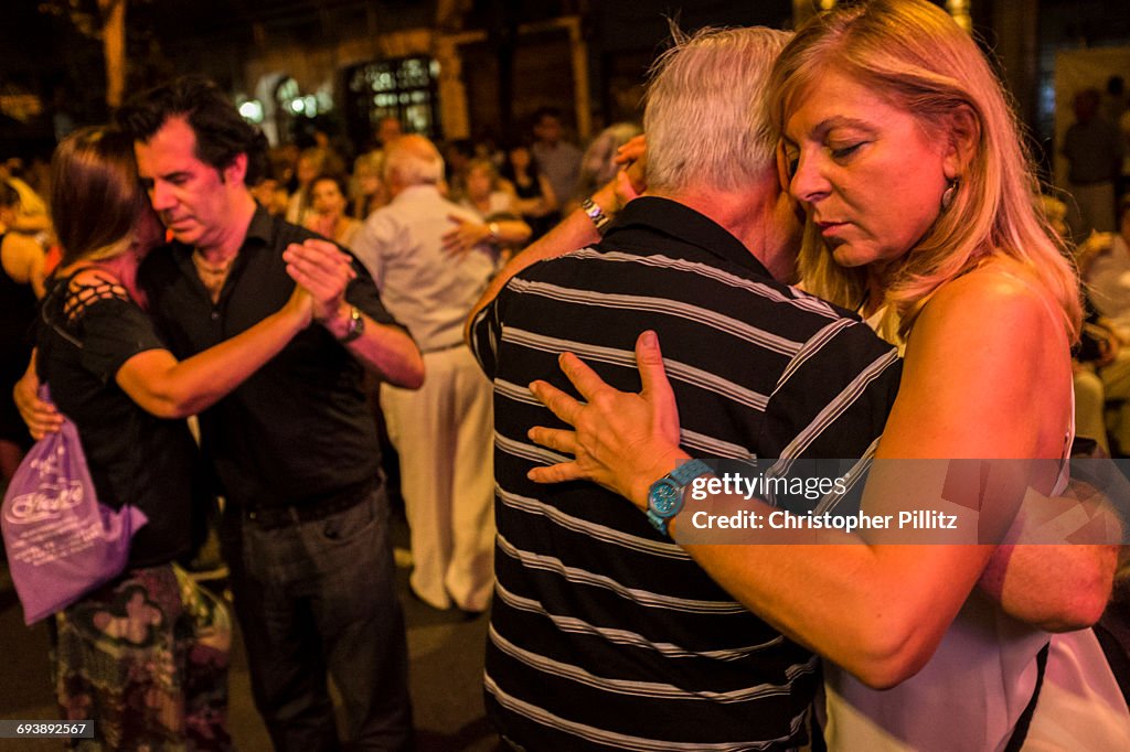 Couples dance Tango on the streets of Bs As.