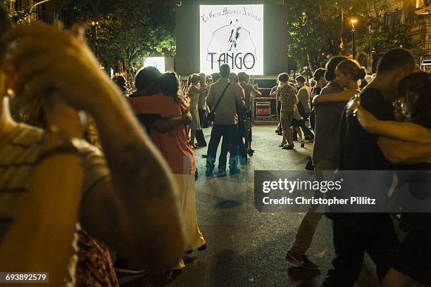 Couples dance Tango and Milongas on Avenida de Mayo, as part of the "National day of culture", Buenos Aires city.