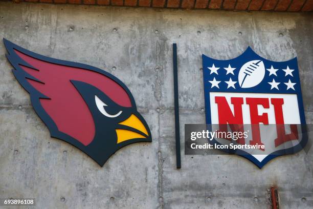 The Arizona Cardinals logo with the NFL logo on June 8, 2017 at Arizona Cardinals Training Facility in Tempe, Arizona.