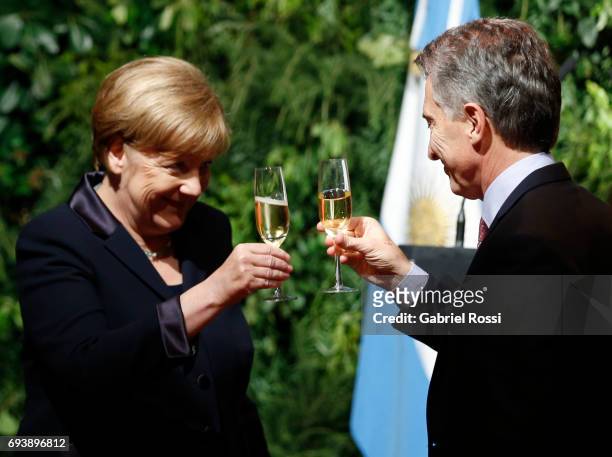 German Chancellor Angela Merkel toasts with President of Argentina Mauricio Macri during a state dinner as part of an official visit of German...