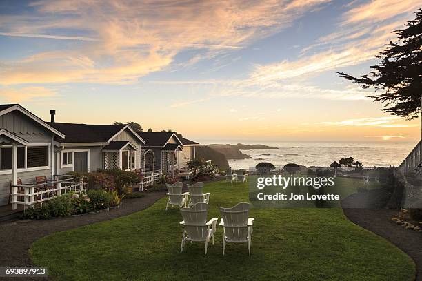 view from boutique hotel lawn on the ocean - inn stock pictures, royalty-free photos & images