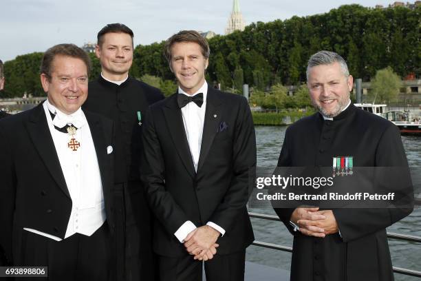 Lawyer Jean-Louis Bosteels, Abbee Gregoire Prichodko, Prince Emmanuel Philibert de Savoy and Abbee Franck Certin attend Charity Gala to Benefit the...