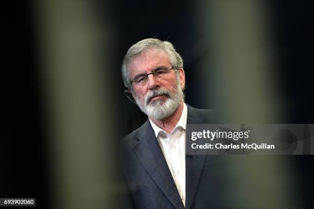 Sinn Fein president Gerry Adams waits to be interviewed by a television station at the Belfast count taking place at the Titanic exhibition centre on...