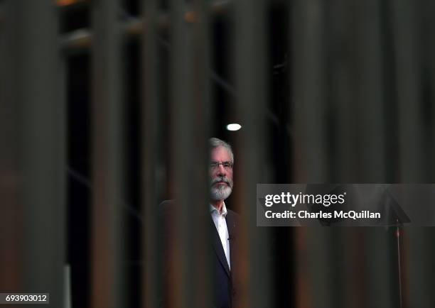 Sinn Fein president Gerry Adams waits to be interviewed by a television station at the Belfast count taking place at the Titanic exhibition centre on...