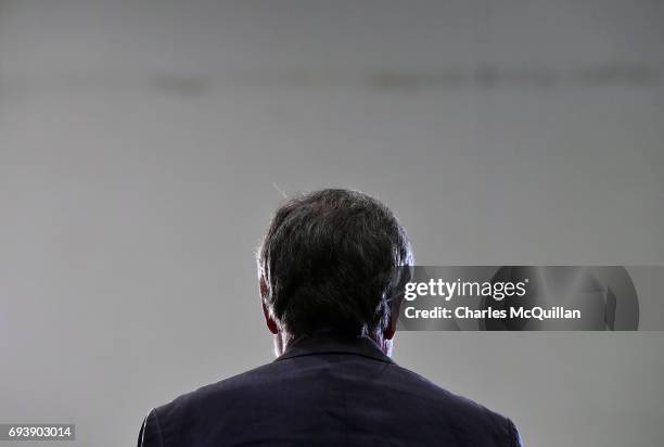 Sinn Fein president Gerry Adams waits to be interviewed by a television station at the Belfast count taking place at the Titanic exhibition centre on...