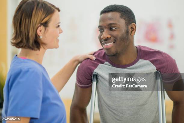 crutches - ankle stock pictures, royalty-free photos & images