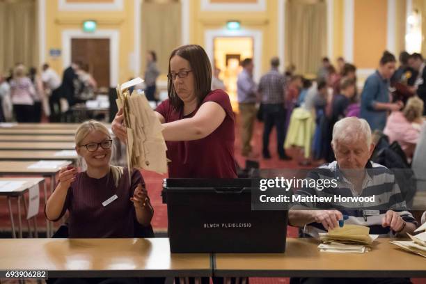 Ballot papers are removed from ballot boxes to be counted at City Hall on June 8, 2017 in Cardiff, United Kingdom. After a snap election was called,...
