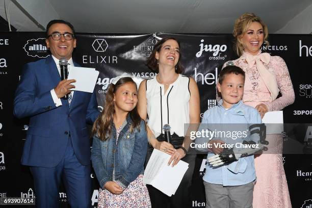 Adal Ramones and Aracely Arambula attend the "Mano A Mano" exposition on June 7, 2017 in Mexico City, Mexico. The objective of this exhibition is to...