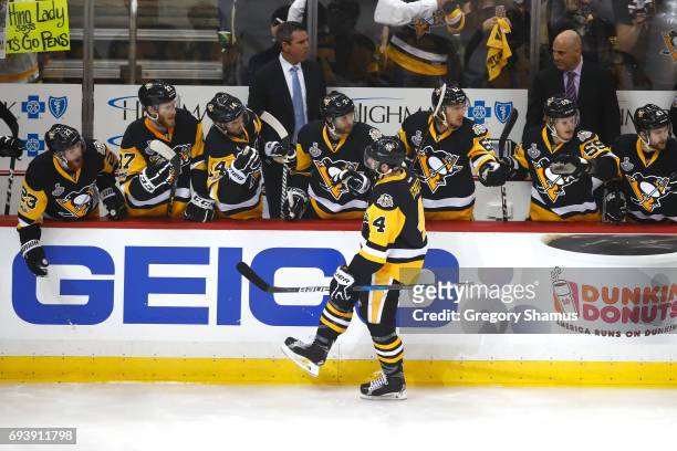Justin Schultz of the Pittsburgh Penguins celebrates after scoring a goal in the first period against the Nashville Predators in Game Five of the...