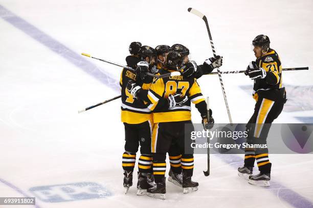 Justin Schultz of the Pittsburgh Penguins celebrates after scoring a goal in the first period against the Nashville Predators in Game Five of the...