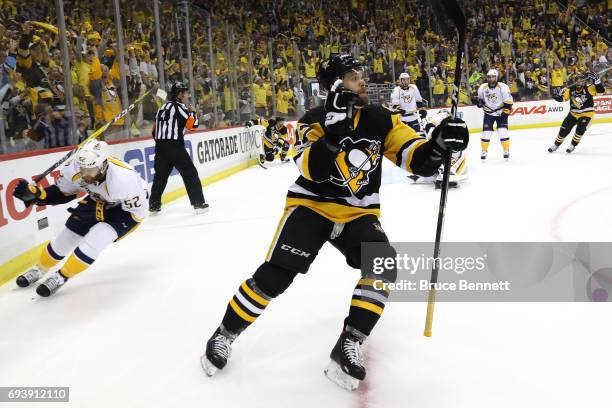 Bryan Rust of the Pittsburgh Penguins celebrates after scoring a goal in the first period against the Nashville Predators in Game Five of the 2017...