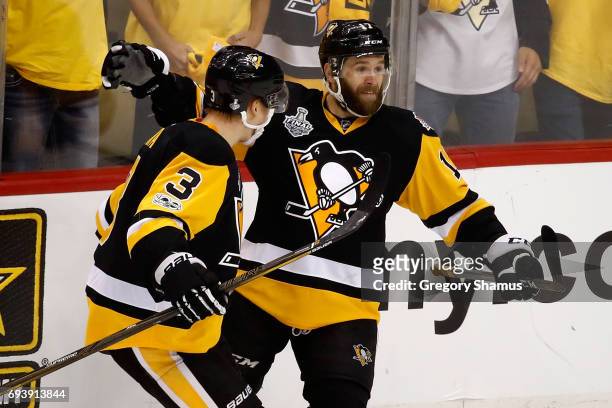 Bryan Rust of the Pittsburgh Penguins celebrates with Olli Maatta after scoring his team's second goal in the first period against the Nashville...