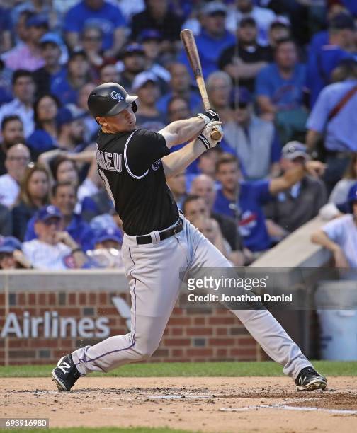 LeMahieu of the Colorado Rockies hits a three run home run in the 2nd inning against the Chicago Cubs at Wrigley Field on June 8, 2017 in Chicago,...