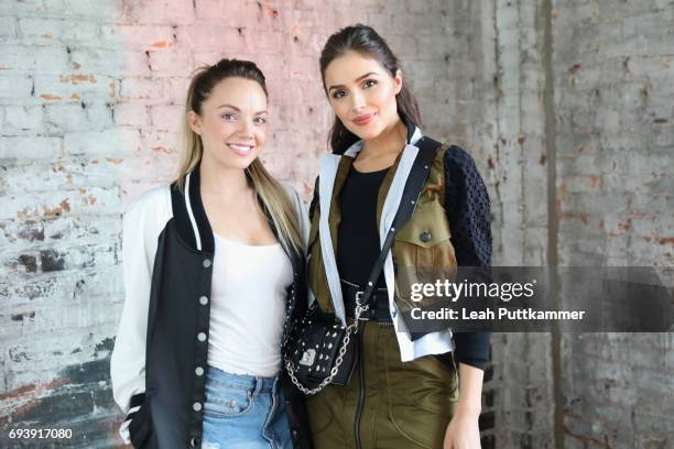 Danielle Bradbery and Olivia Culpo attend DSW & ELLE Happy Hour event celebrating DSW's #MarchOn USA Tour at Acme Feed & Seed on June 8, 2017 in...