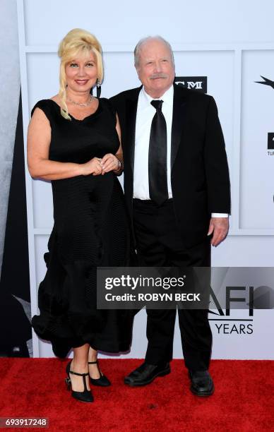 Actor Richard Dreyfuss poses with his wife Svetlana Erokhin upon arrival for the AFI Life Achievement Award Gala honoring Diane Keaton in Hollywood,...