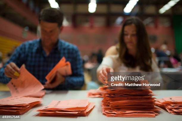 Ballot papers are counted at the Sport Wales National Centre on June 9, 2017 in Cardiff, United Kingdom. After a snap election was called, the United...