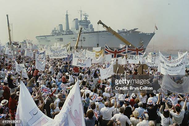 The Royal Navy's aircraft carrier, H.M.S. Invincible returns to Portsmouth harbour, carrying Prince Andrew and other service personnel following the...