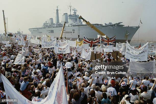 The Royal Navy's aircraft carrier, H.M.S. Invincible returns to Portsmouth harbour, carrying Prince Andrew and other service personnel following the...